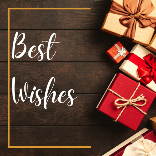 Best Wishes, lots of gifts on a wood table.