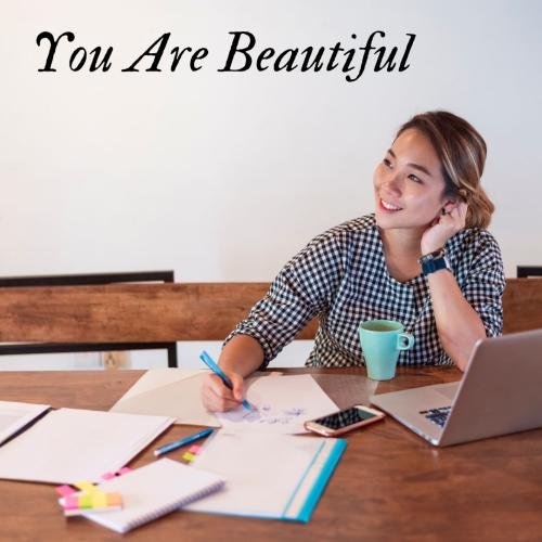 Girl writing on paper looking beautiful