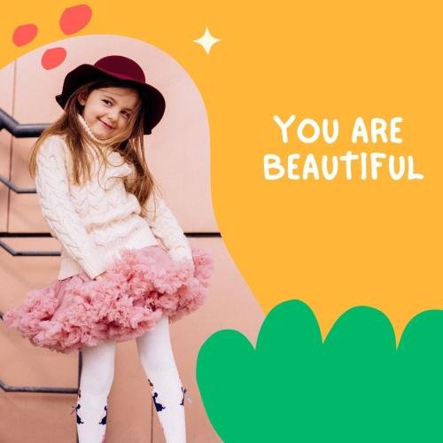 Small girl looking beautiful in pink flower dress