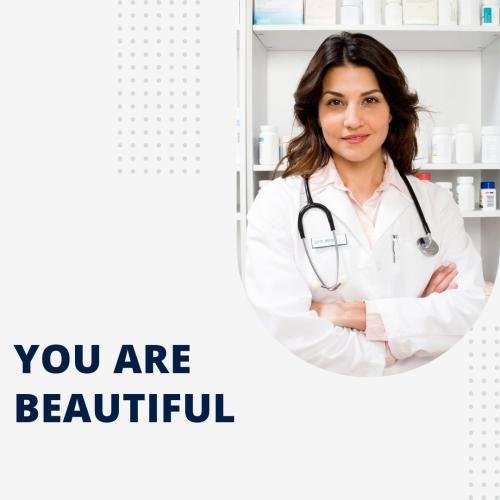 The doctor looks beautiful in a white coat.