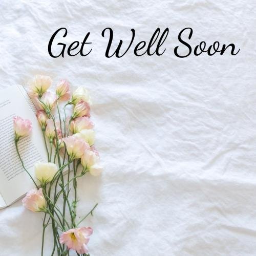 Get well soon with flowers and white background