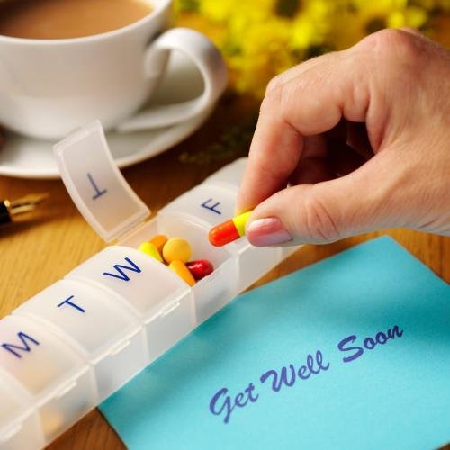 Take medicine with a get well soon note 