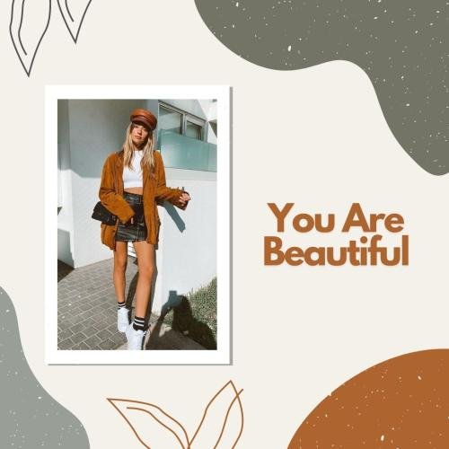 Girl looking beautiful in orange cap and coat.