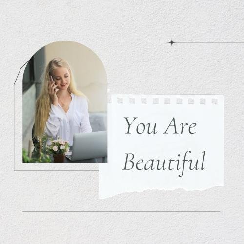 The girl looks beautiful with a laptop and flowers.