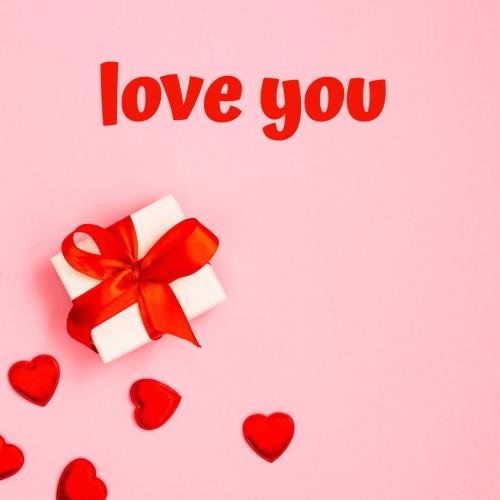 Gift box and hearts on wish card Love you