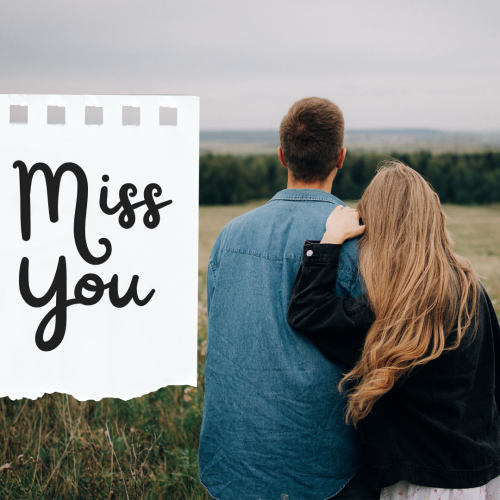 Miss You, Couple sitting in a field.