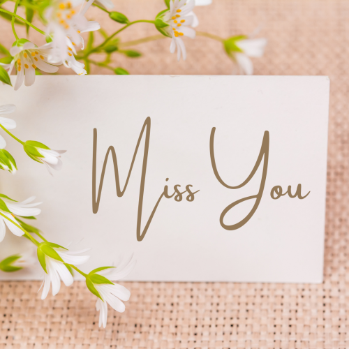 Miss You, flowers and card on card.