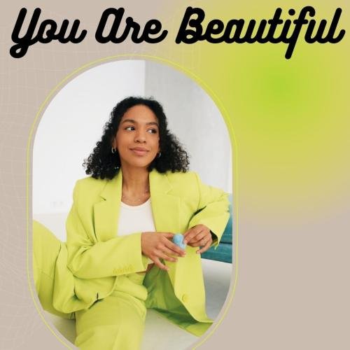 Girl in yellow suit looking beautiful