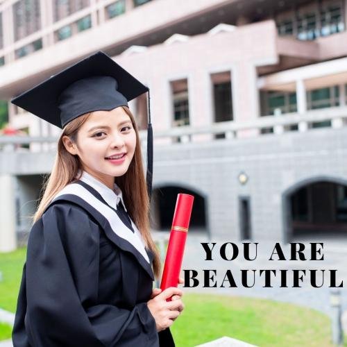 Girl smiling wearing graduation hat is looking beautiful