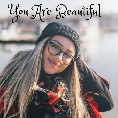 The girl looks beautiful wearing glasses.