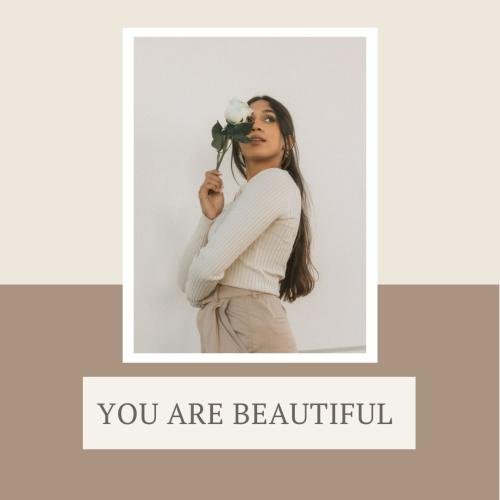 A girl looking beautiful with a flower