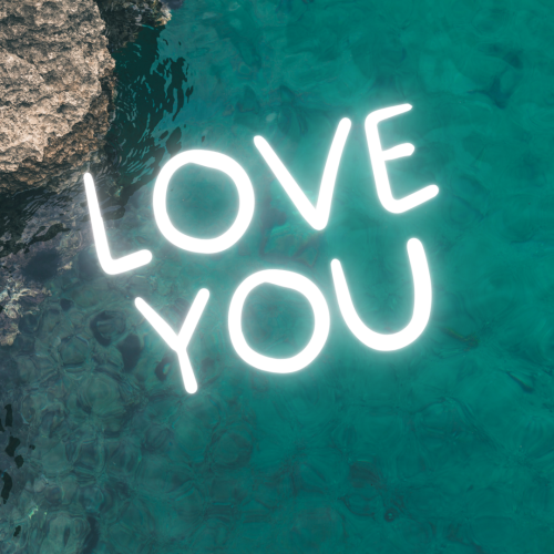 Love you written on a beautiful Sea.