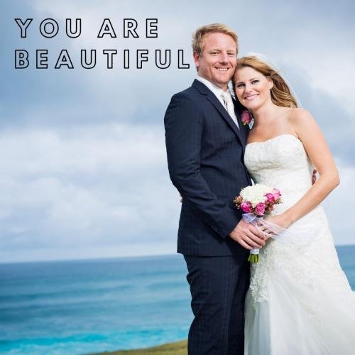 The couple looks beautiful with flowers.