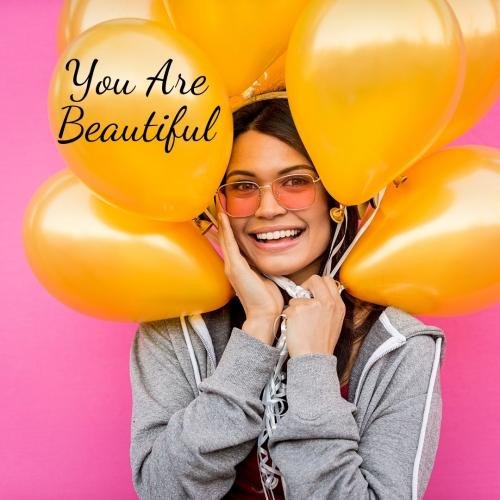Girl looking beautiful with balloons