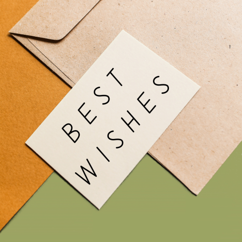 White paper and a letter, Best Wishes.