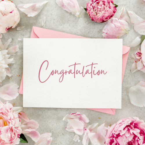 Congratulation, flowers and the letter on a design.