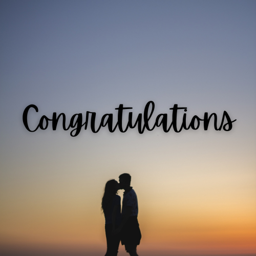 Congratulations, a couple kiss together.