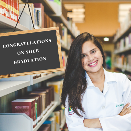  Congratulations On Your Graduation. Girl Stand In The Library.
