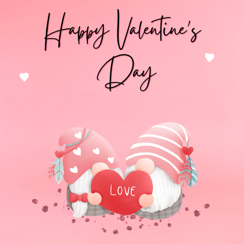 Happy Valentine's Day, two toy holding a heart.