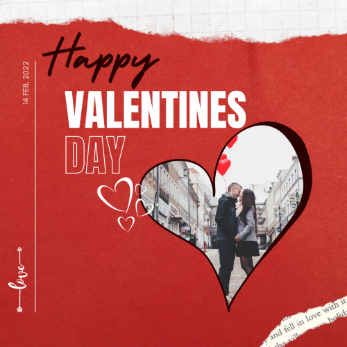 Happy valentines day, a couple standing in the middle of the city.