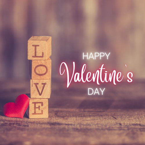 Four wooden block love written on it, Happy valentines day.