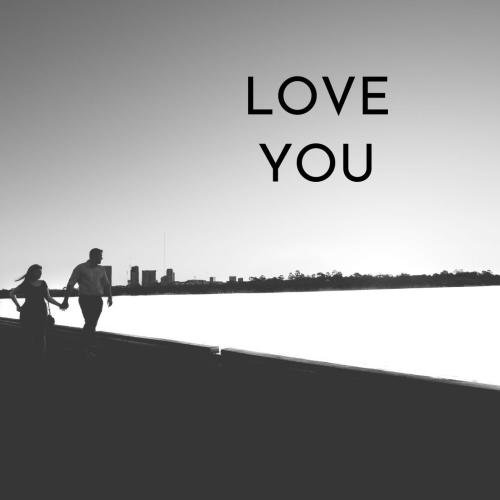 Couple holding hands on lake side Love you.