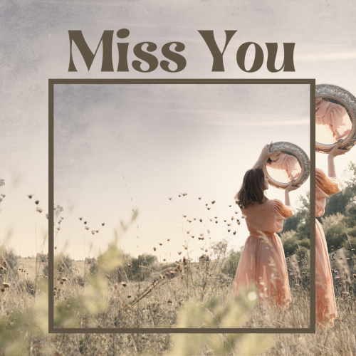 A girl standing in a field, Miss You.