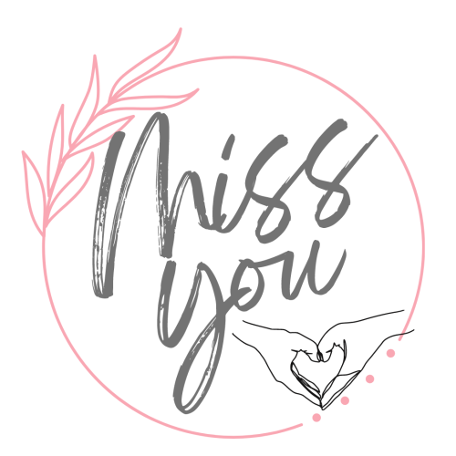 Flower on a round shape, a heart made with hands, Miss you