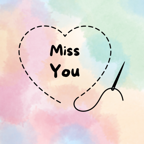 Heart and Miss you on a rainbow background.