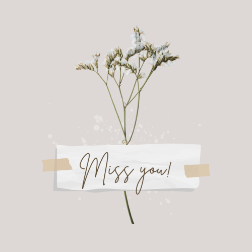 Simple white flower and a white paper, Miss You.