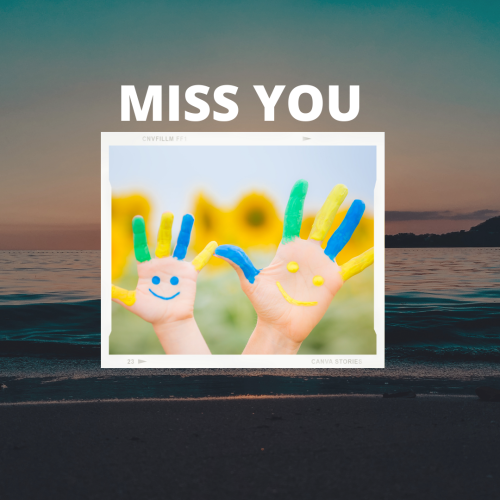 Miss you, smiling face drawing on a hand.