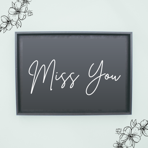 Black board on a wish card, Miss You.